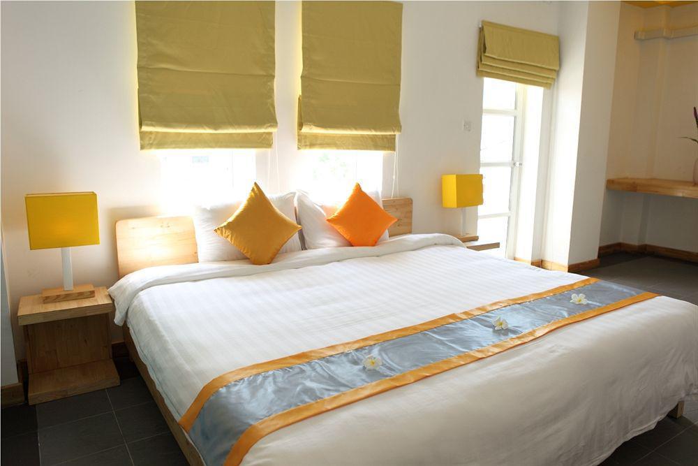 The Frangipani Living Arts Hotel And Spa Phnom Penh Extérieur photo